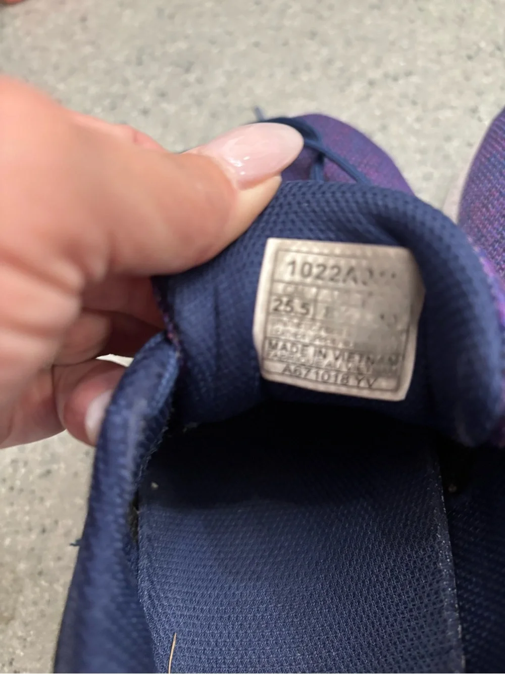 Asics women’s Navy and Purple Athletic Running Shoes